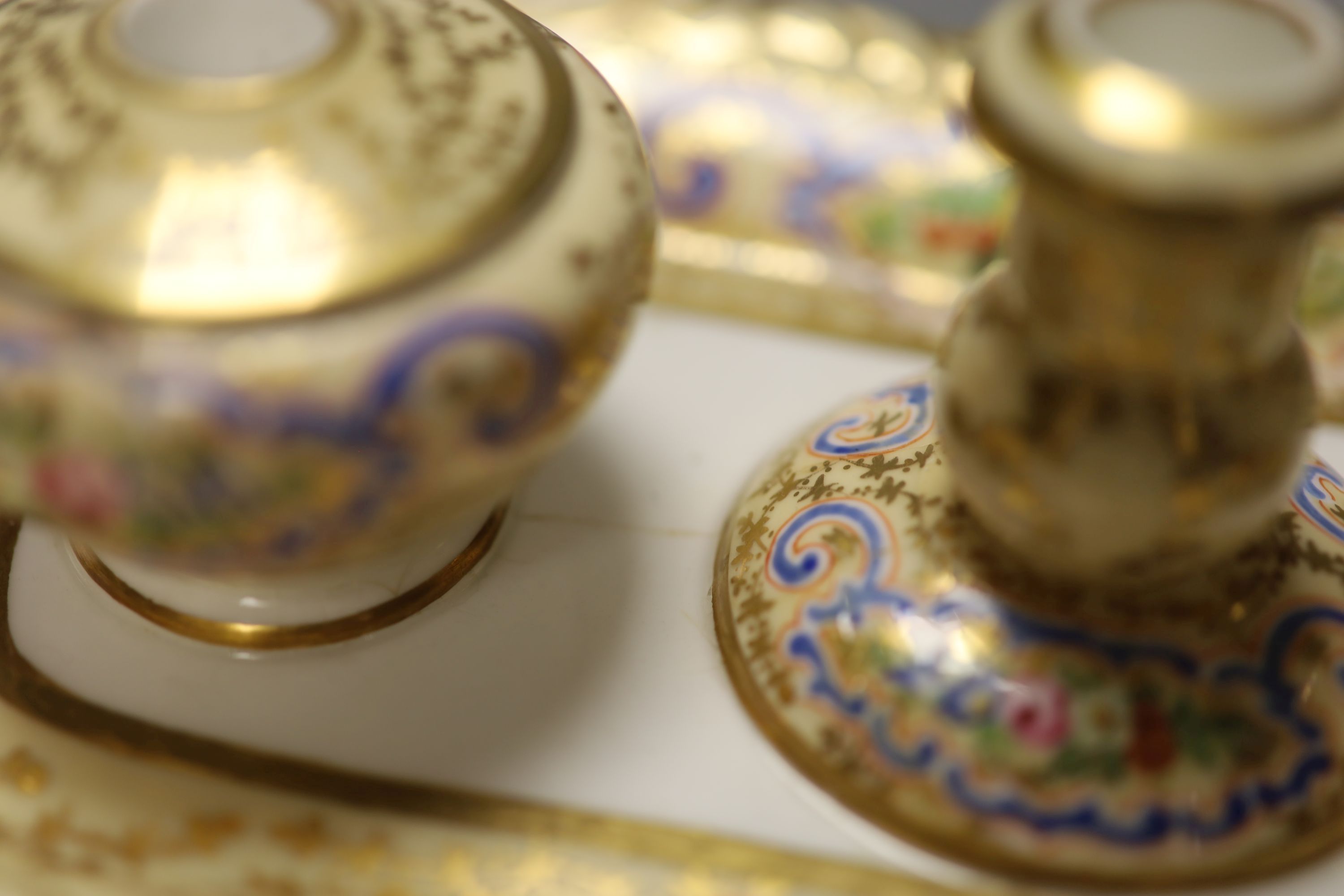 A Copeland and Garrett inkstand with fixed pots and candlestick and two covers,